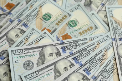 Money exchange. Dollar banknotes as background, closeup