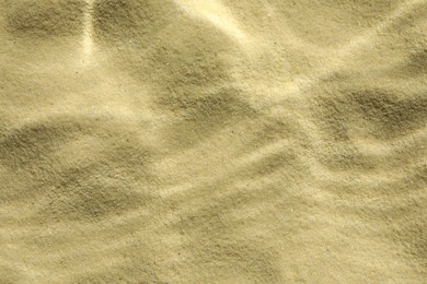 Photo of Sand under water as background, top view