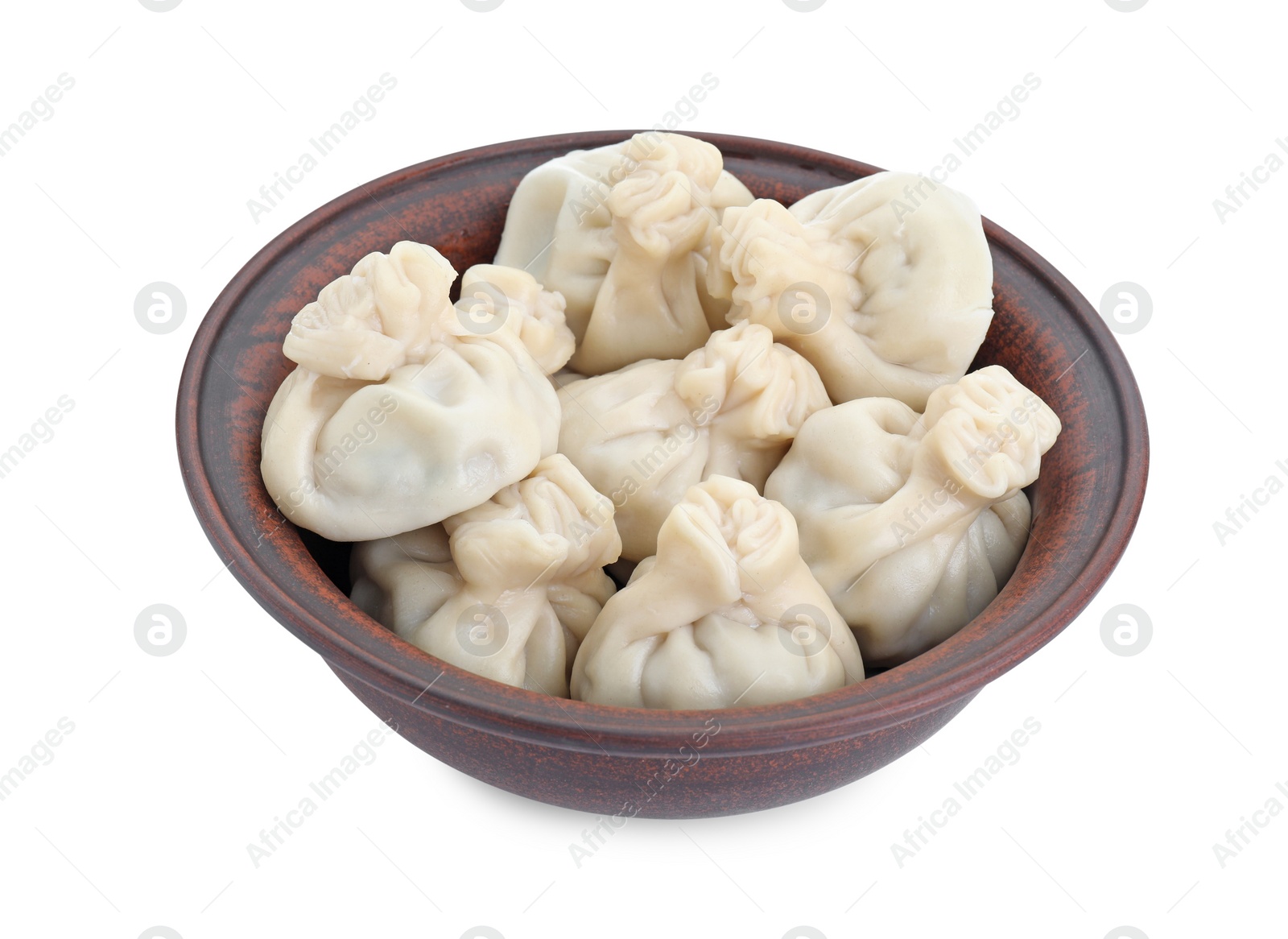 Photo of Tasty khinkali (dumplings) in bowl isolated on white. Georgian cuisine