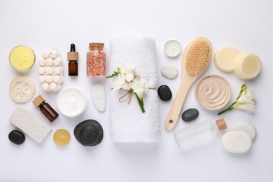 Flat lay composition with different spa products on white background