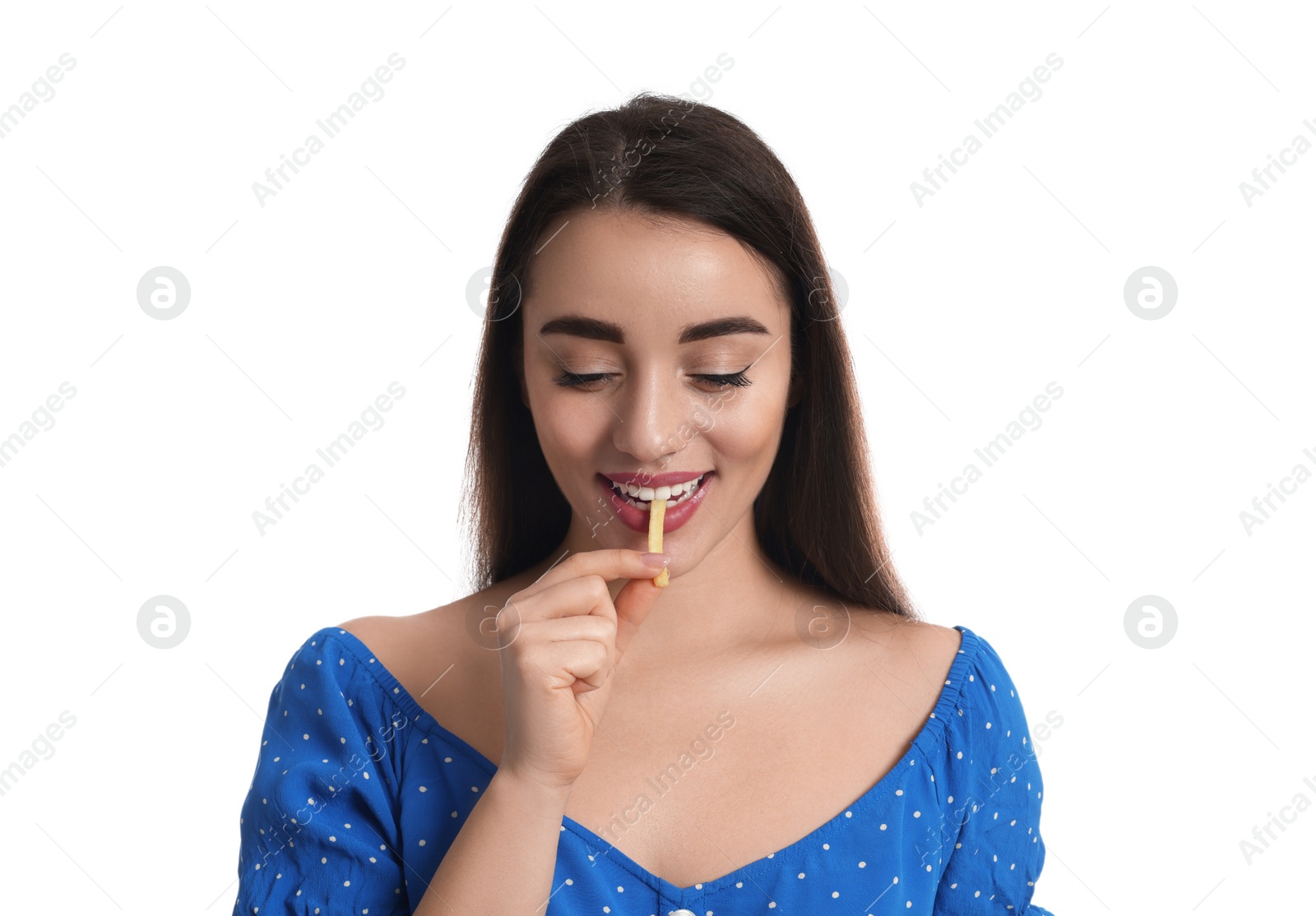 Photo of Beautiful young woman eating French fries on white background