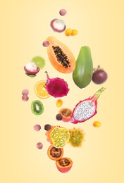 Different tasty exotic fruits flying on yellow background