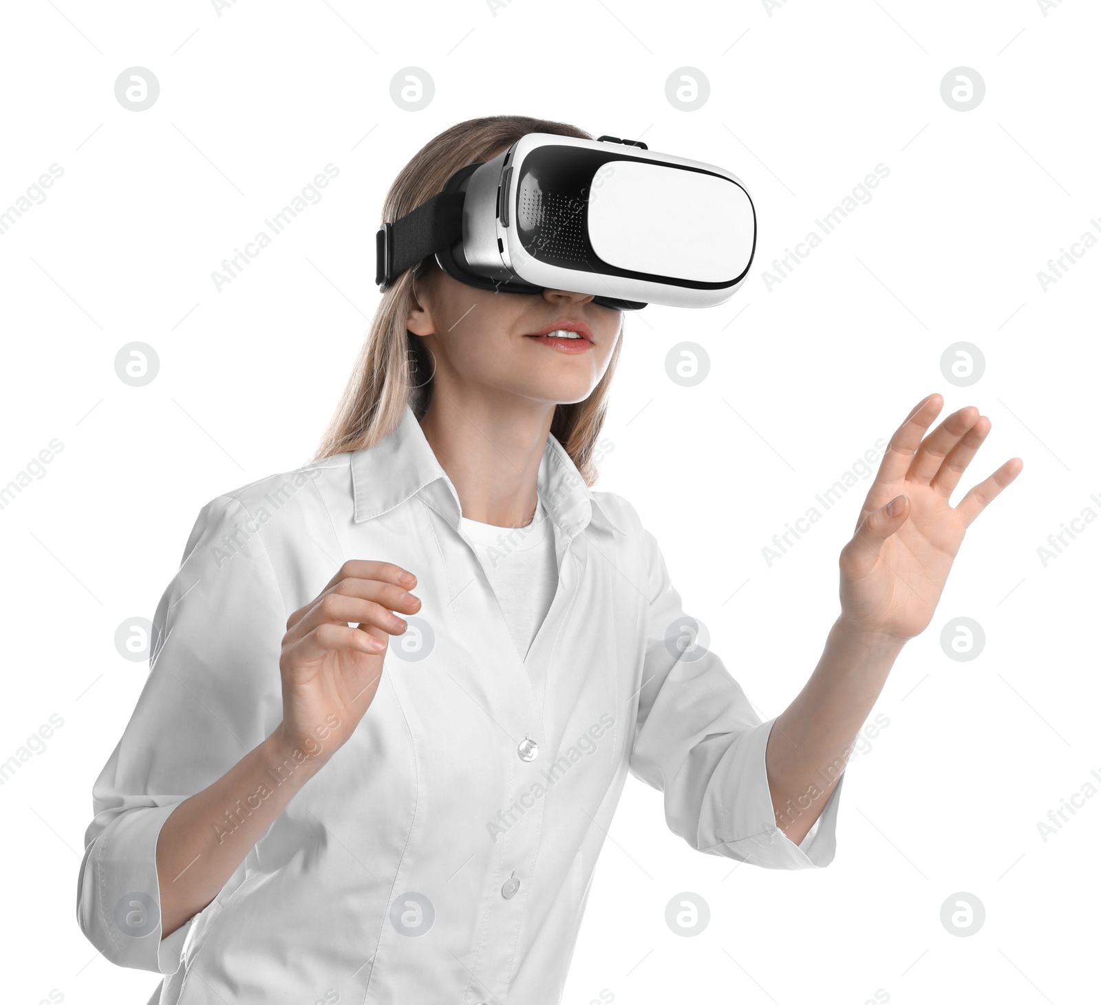 Photo of Young woman using virtual reality headset on white background