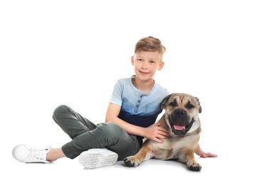 Cute little child with his dog on white background