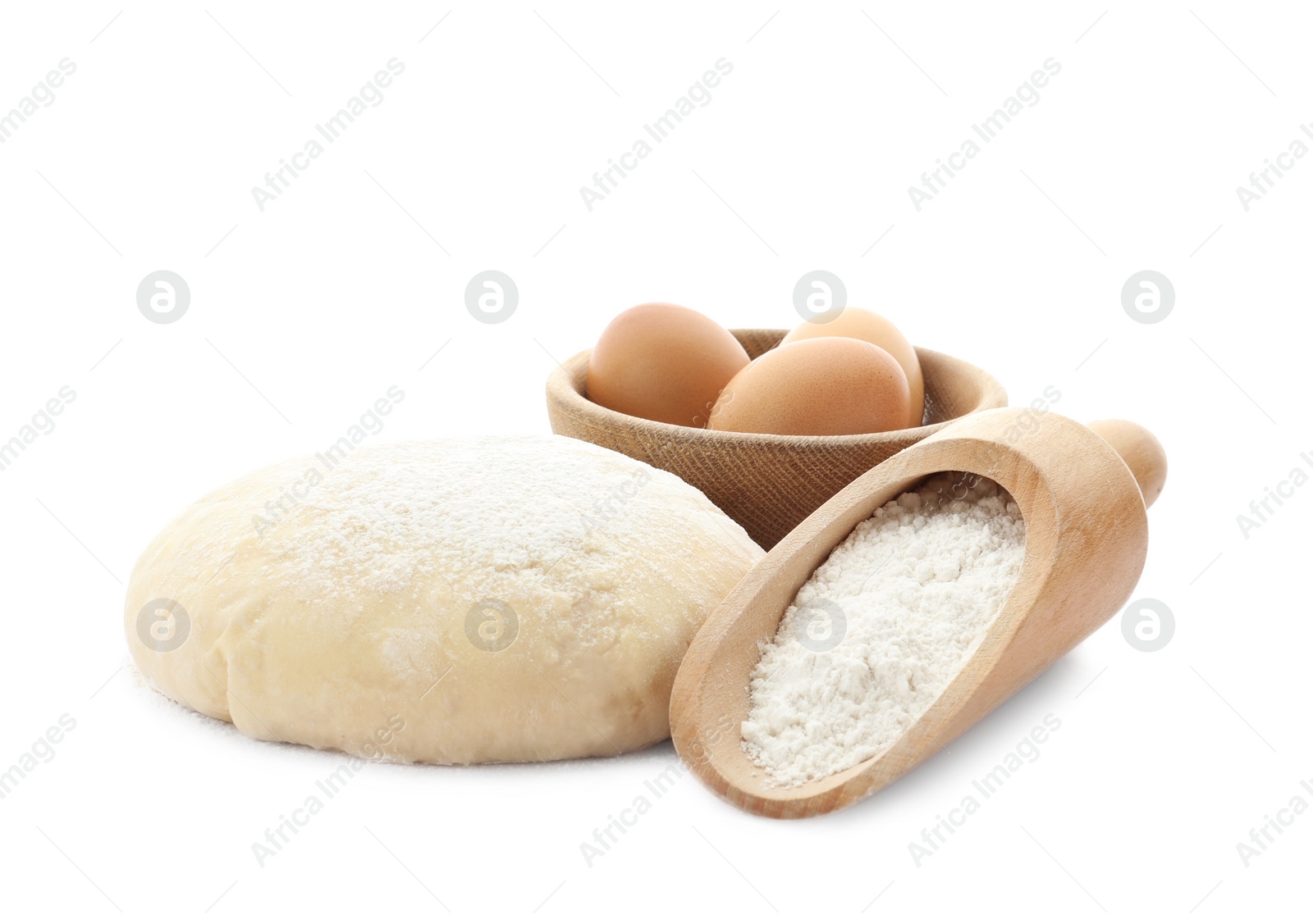 Photo of Dough, eggs and flour on white background. Cooking pastries