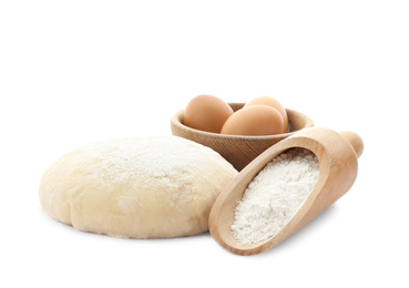 Photo of Dough, eggs and flour on white background. Cooking pastries