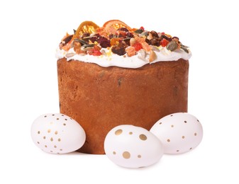 Traditional Easter cake with dried fruits and painted eggs isolated on white