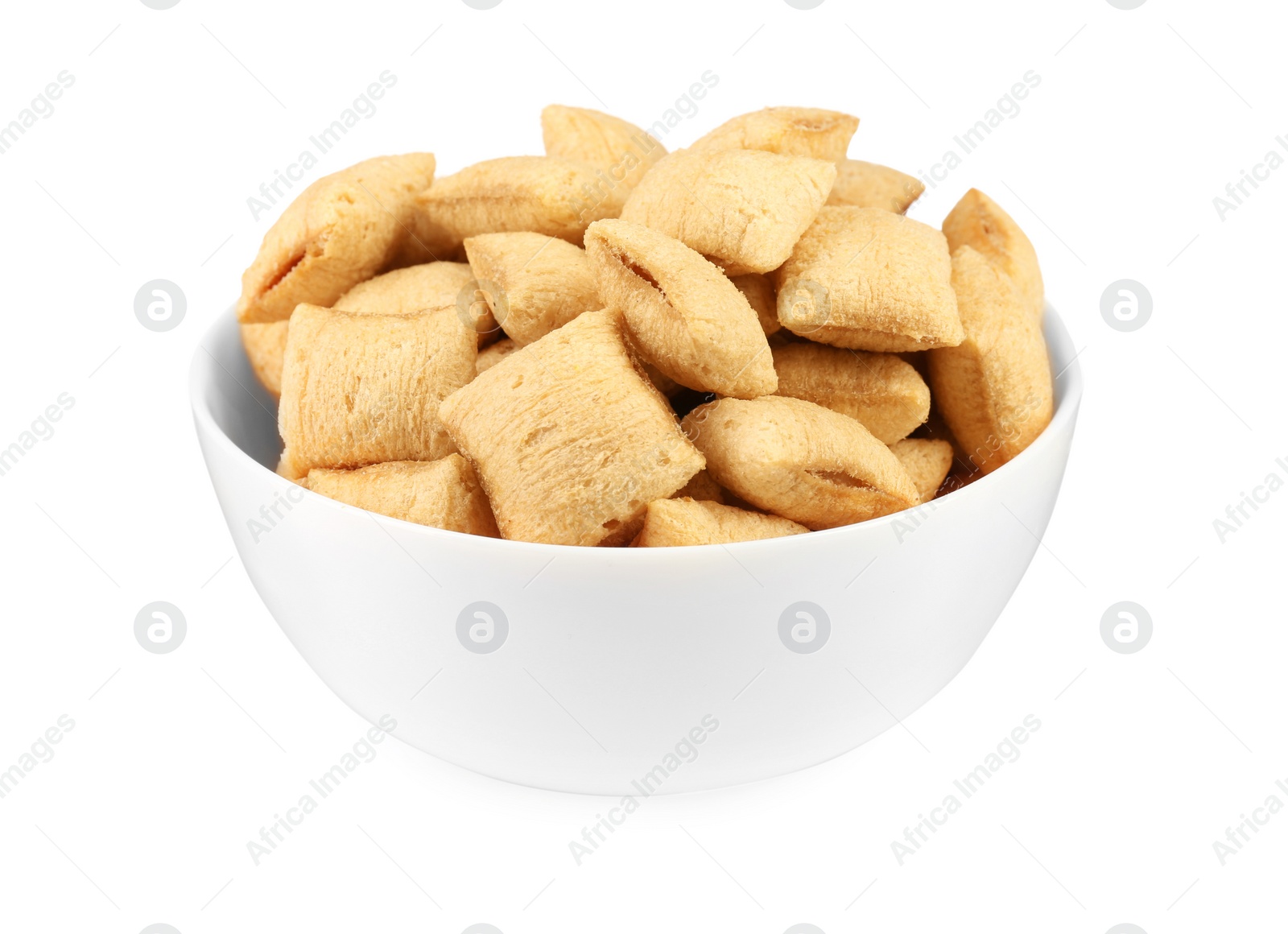 Photo of Bowl of sweet crispy corn pads on white background. Breakfast cereal
