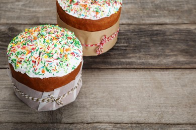 Traditional Easter cakes with sprinkles, space for text