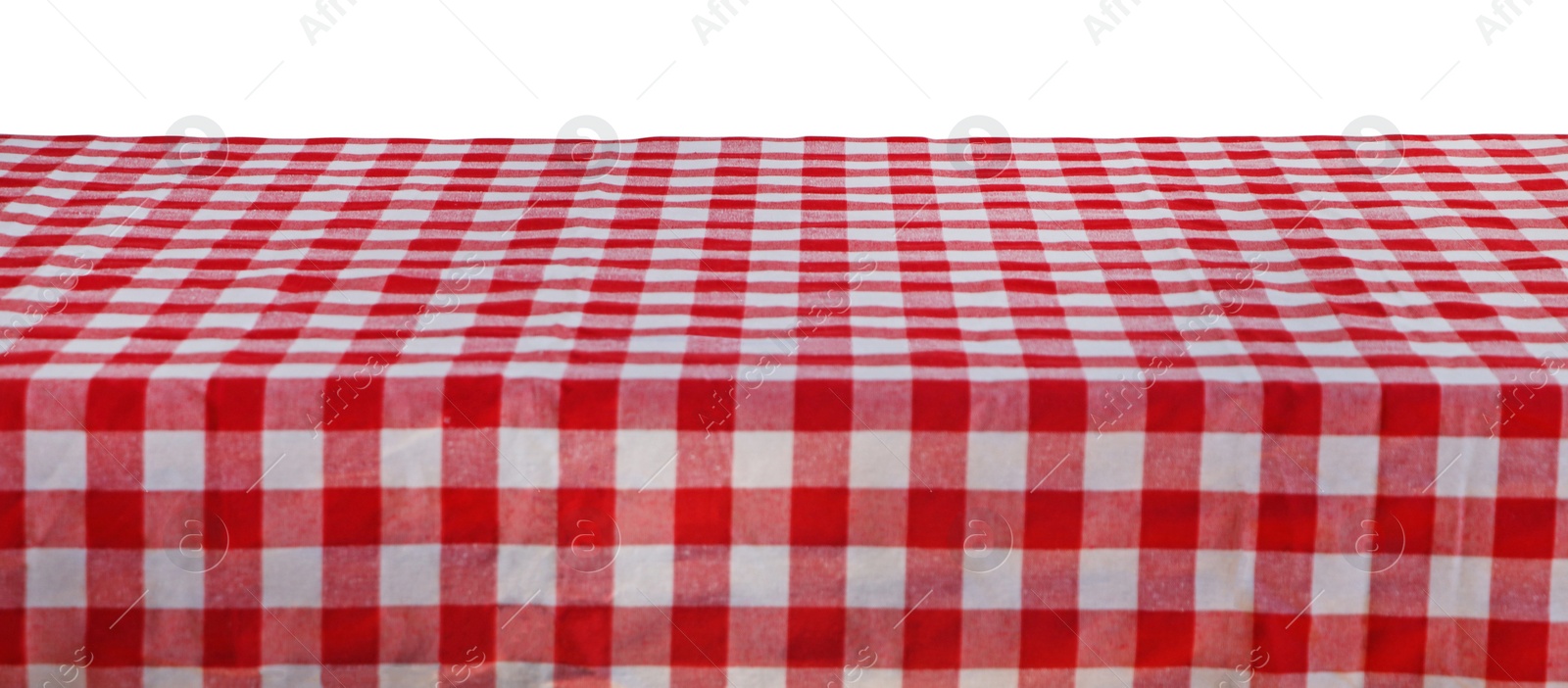 Photo of Table with checkered picnic cloth isolated on white