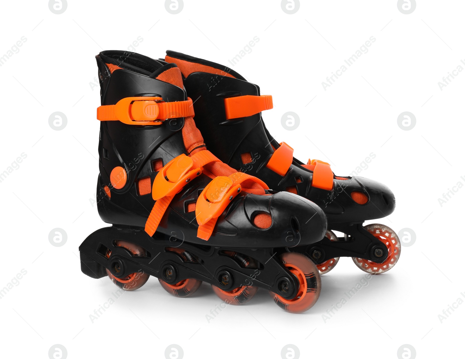 Photo of Pair of inline roller skates on white background