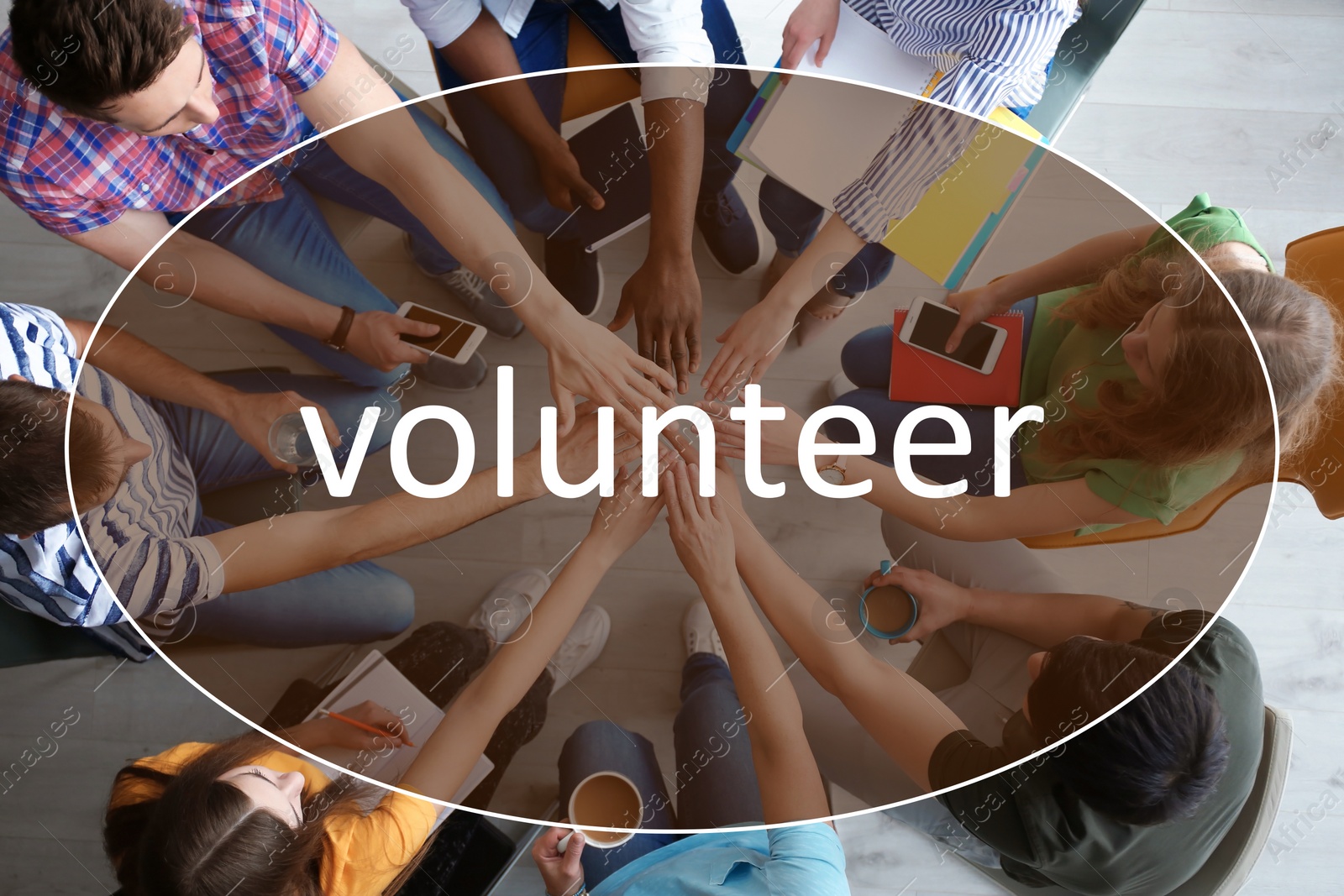 Image of Group of volunteers putting hands together indoors, top view