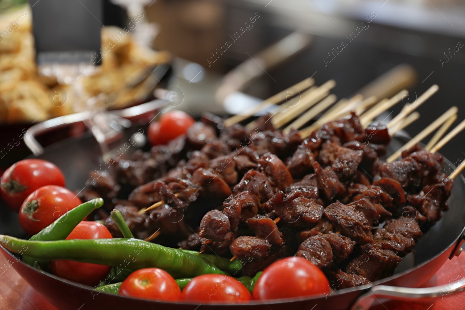 Photo of Delicious grilled meat served on table, closeup view