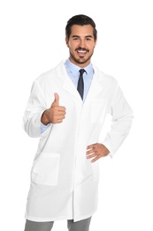 Photo of Portrait of young male doctor on white background. Medical service