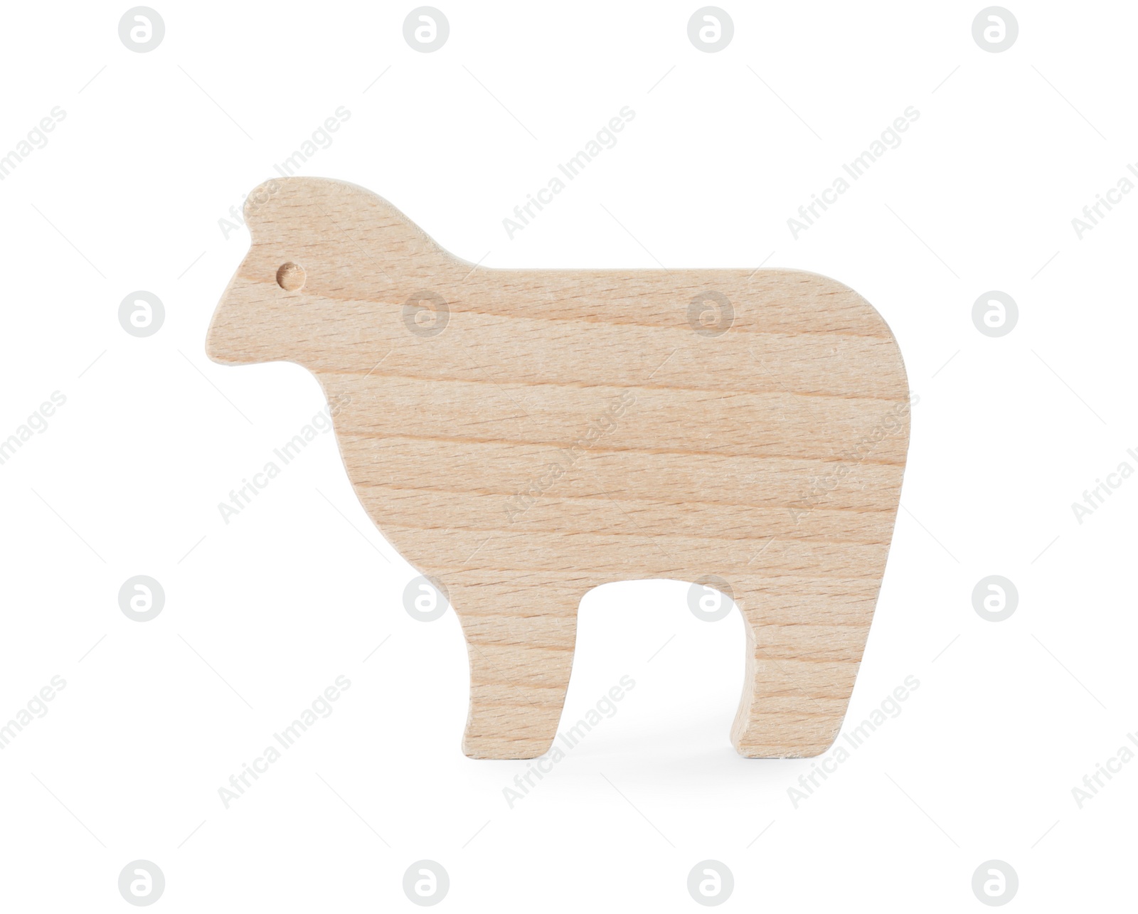 Photo of Wooden sheep isolated on white. Children's toy