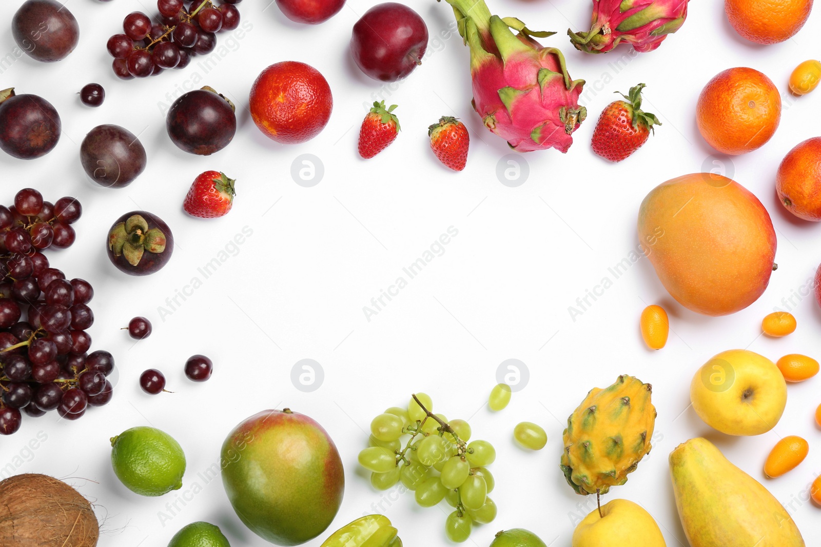 Photo of Frame of different delicious exotic fruits on white background, flat lay. Space for text