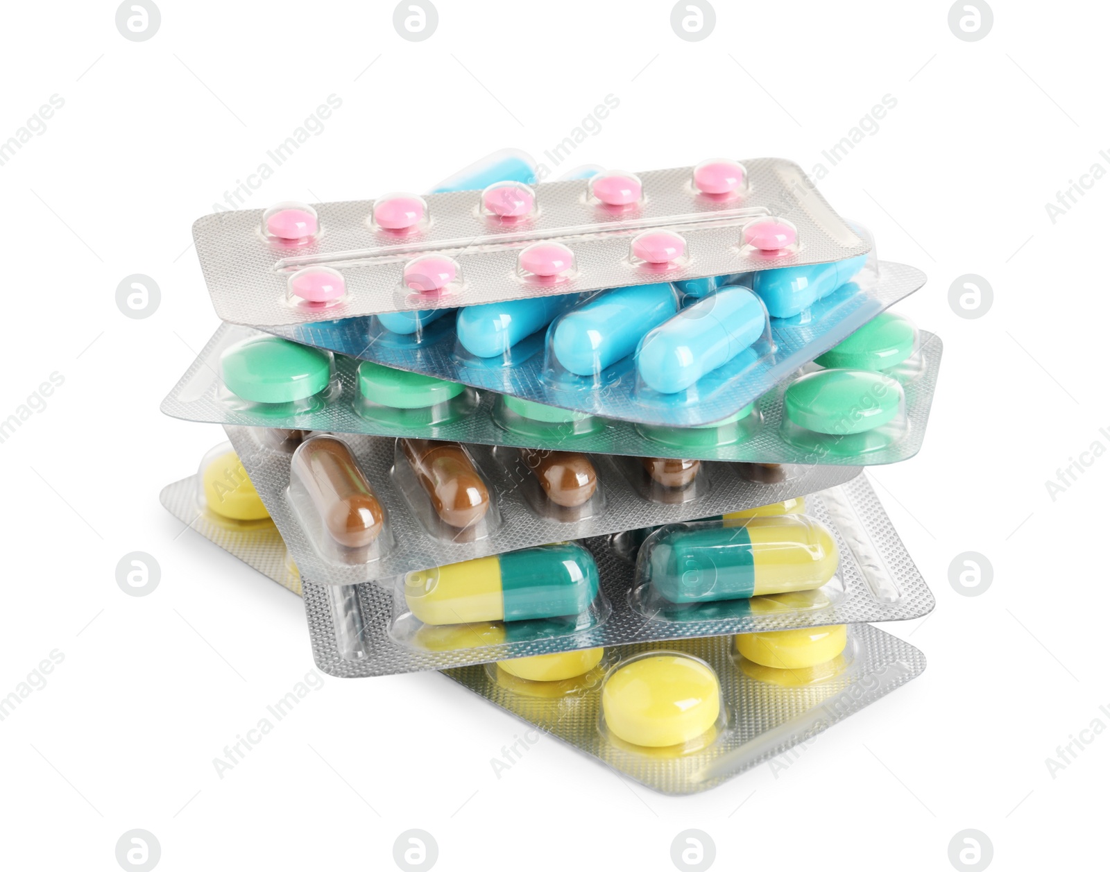 Photo of Stack of blisters with different pills on white background