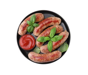 Photo of Plate with tasty homemade sausages, ketchup and basil leaves on white background, top view