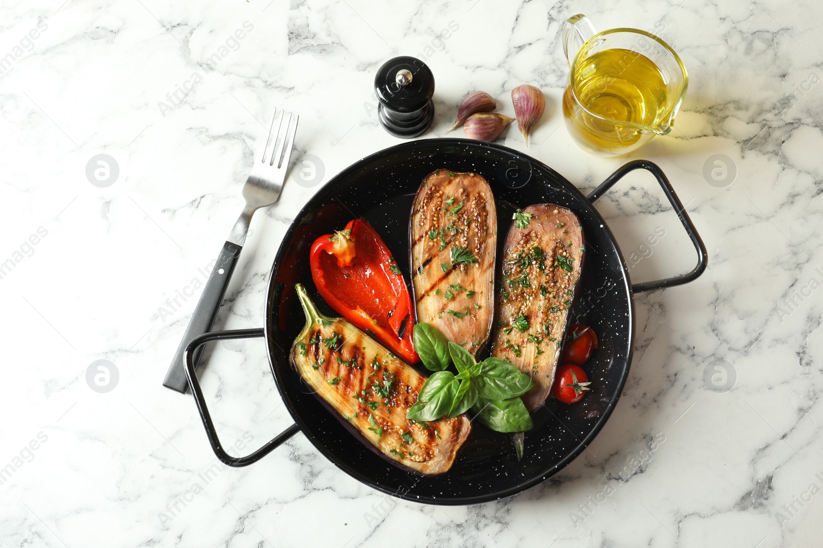 Photo of Flat lay composition with grill pan of fried eggplants on marble table