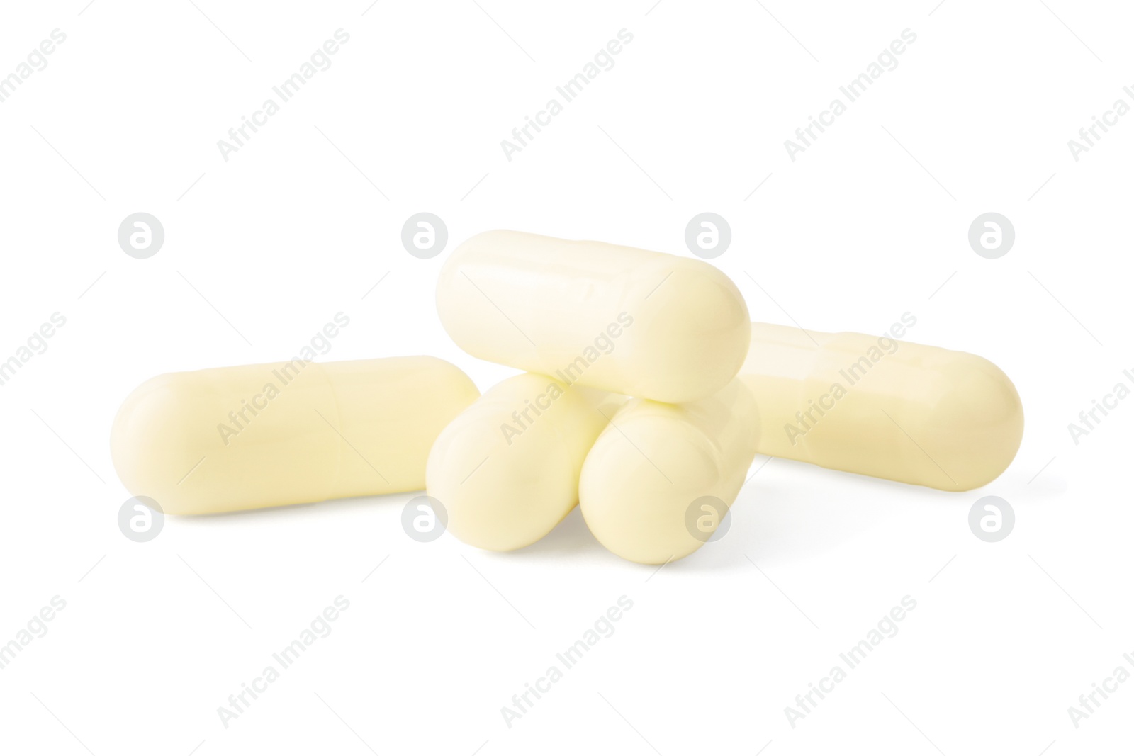 Photo of Vitamin capsules isolated on white. Health supplements