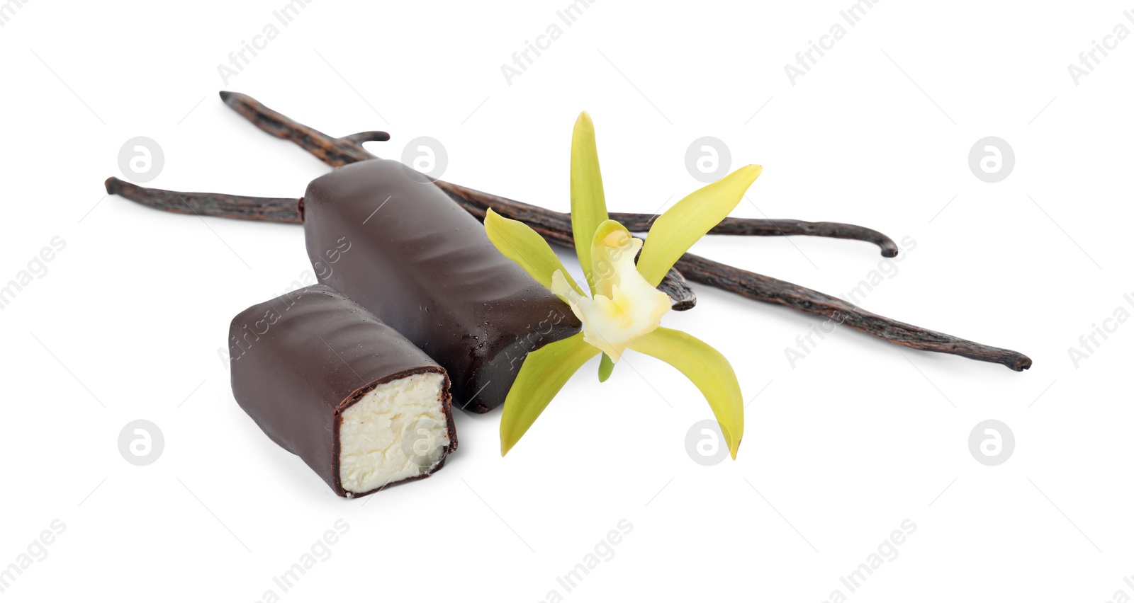 Photo of Glazed curd cheese bars, vanilla pods and flower isolated on white