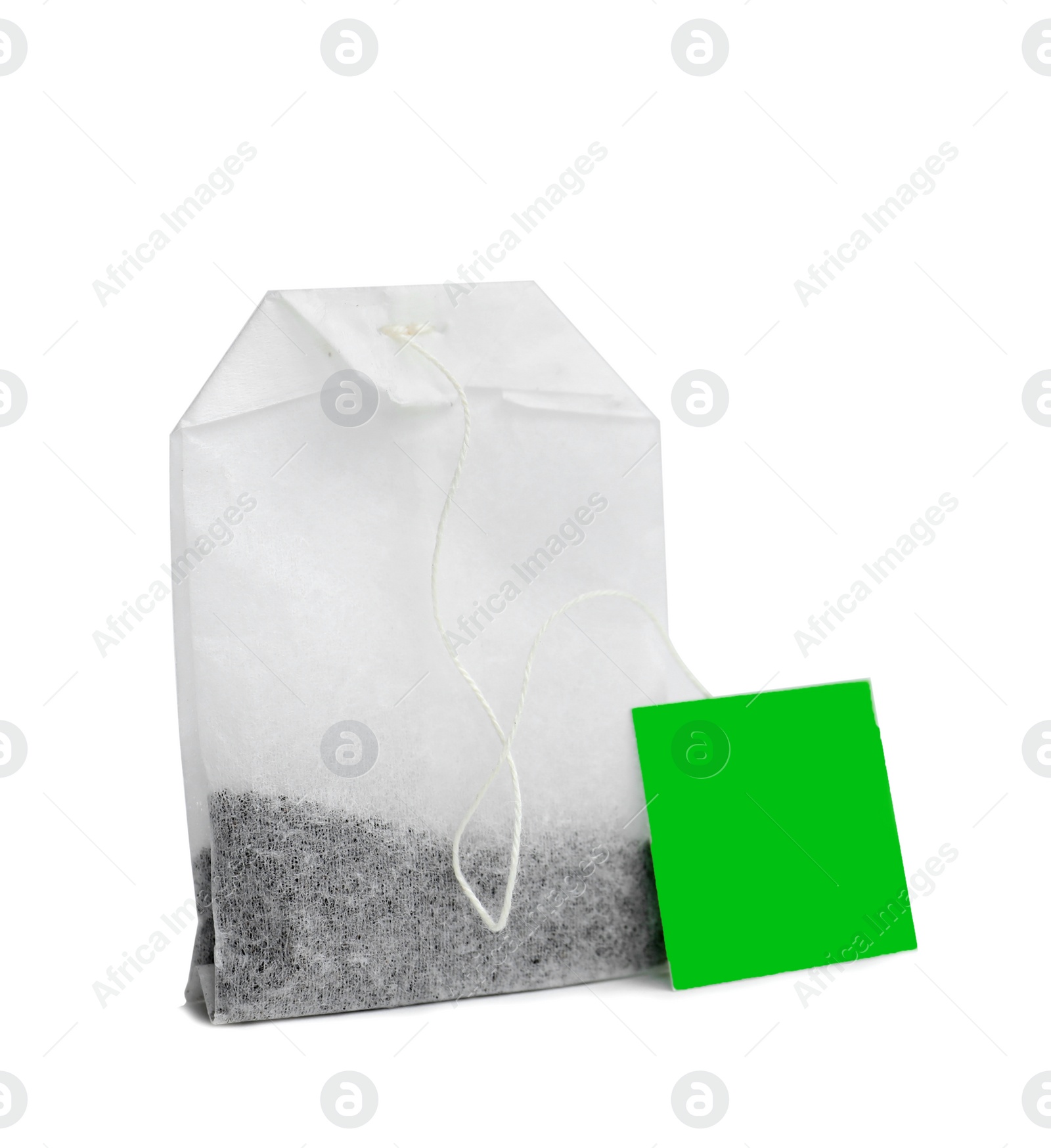 Photo of Tea bag on white background. Aromatic drink