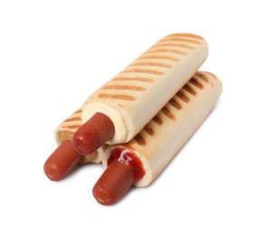 Photo of Tasty french hot dogs with different sauces on white background