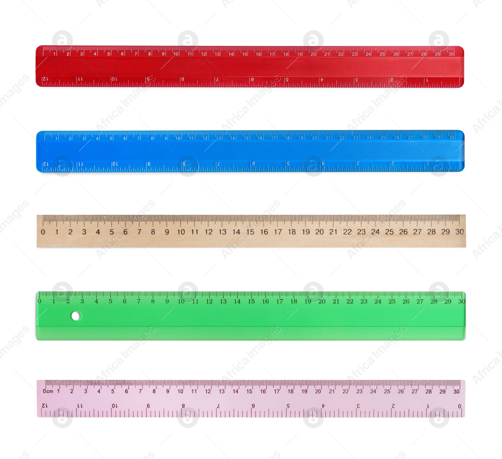 Image of Set with different rulers with measuring length markings in centimeters on white background