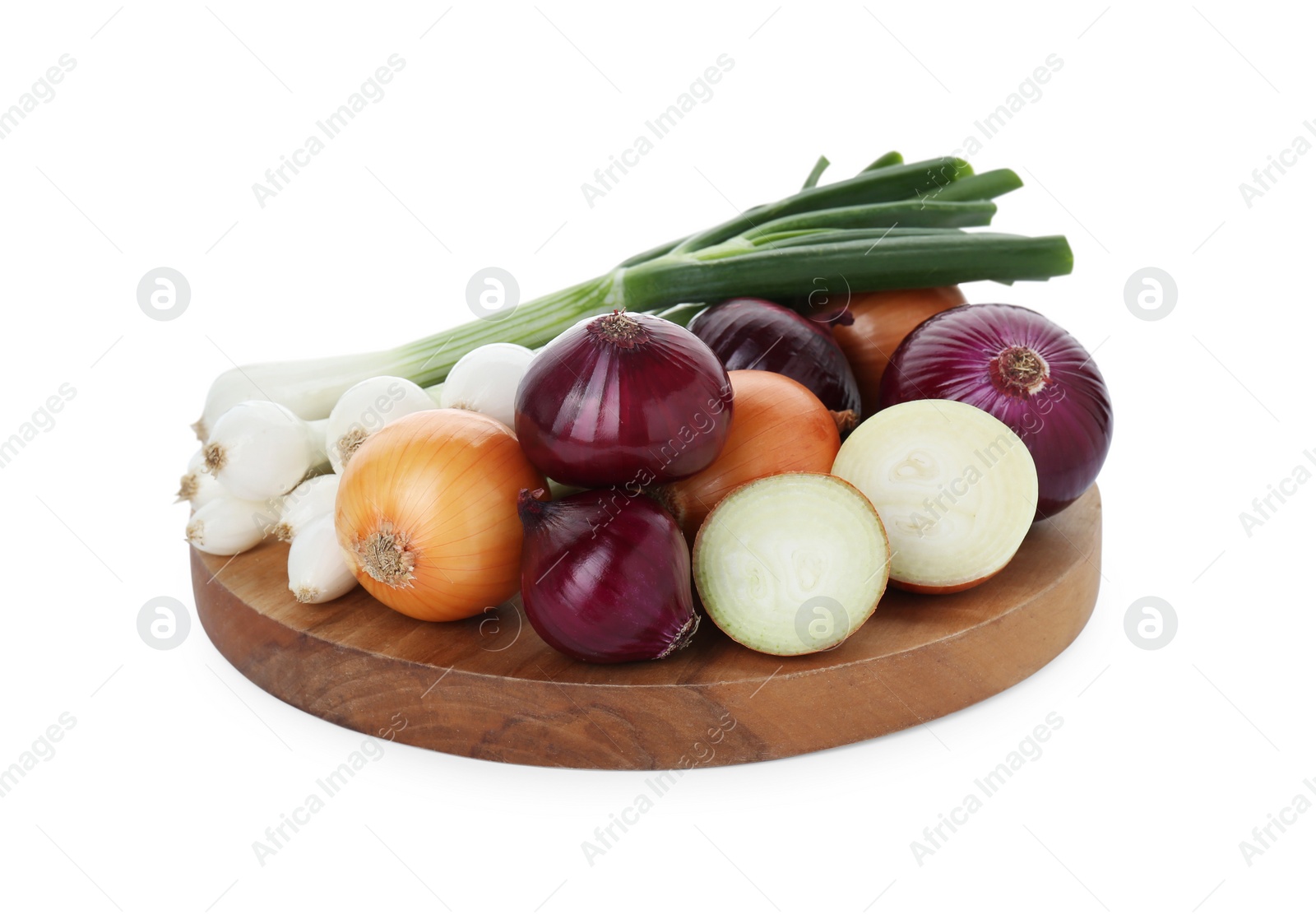 Photo of Wooden board with different kinds of onions isolated on white