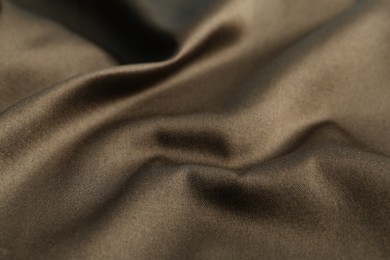 Texture of beautiful brown fabric as background, closeup