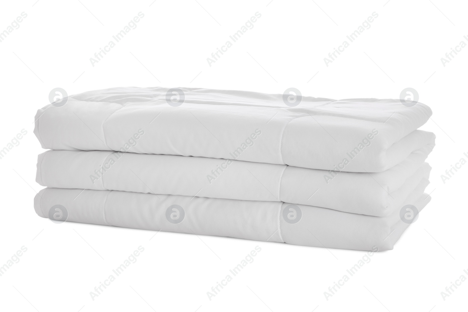 Photo of Folded clean blanket isolated on white. Household textile