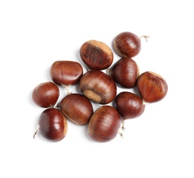 Fresh sweet edible chestnuts on white background, top view