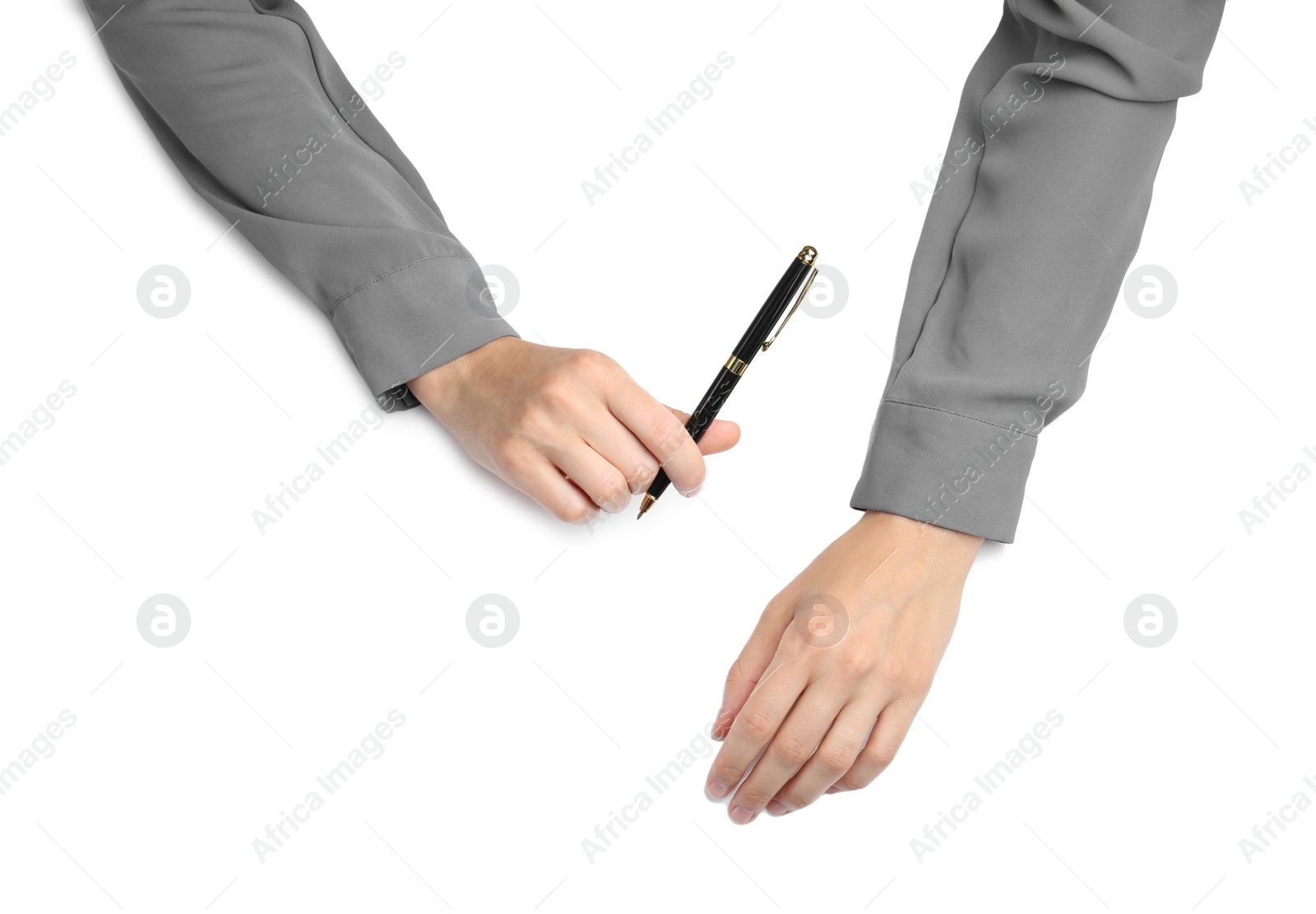 Photo of Woman with pen on white background, top view. Closeup of hands