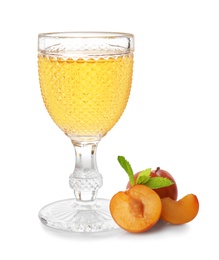 Photo of Delicious plum liquor, ripe fruits and mint on white background. Homemade strong alcoholic beverage