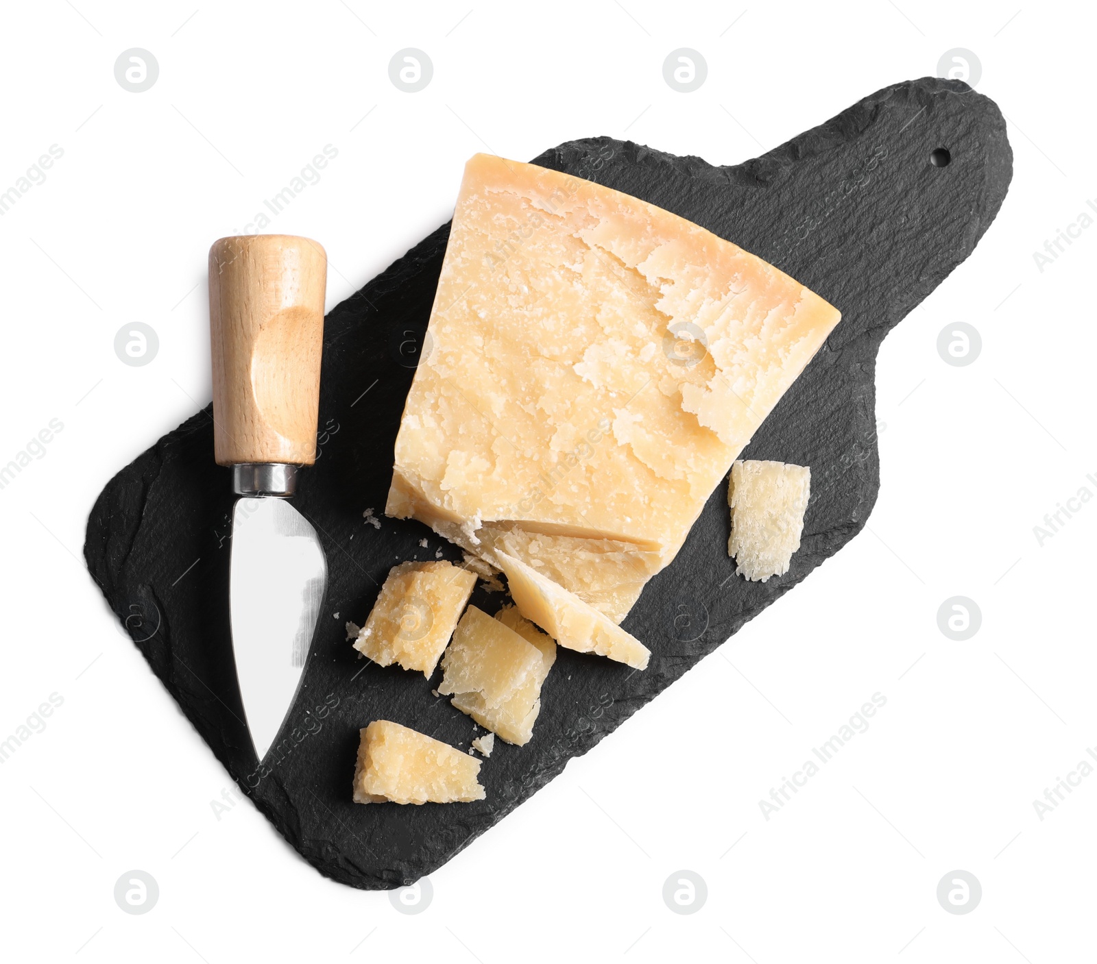 Photo of Parmesan cheese with knife and slate plate on white background, top view