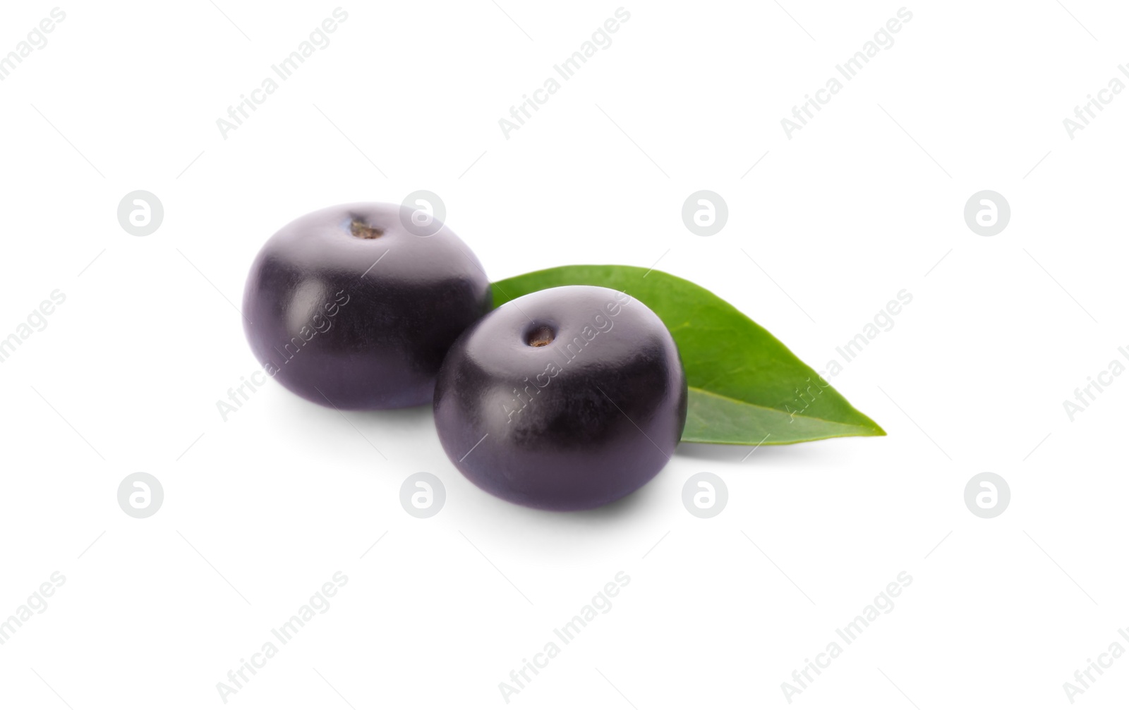 Photo of Fresh acai berries with leaf isolated on white