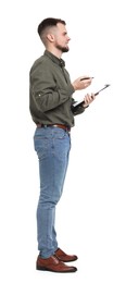 Man in shirt and jeans with clipboard on white background