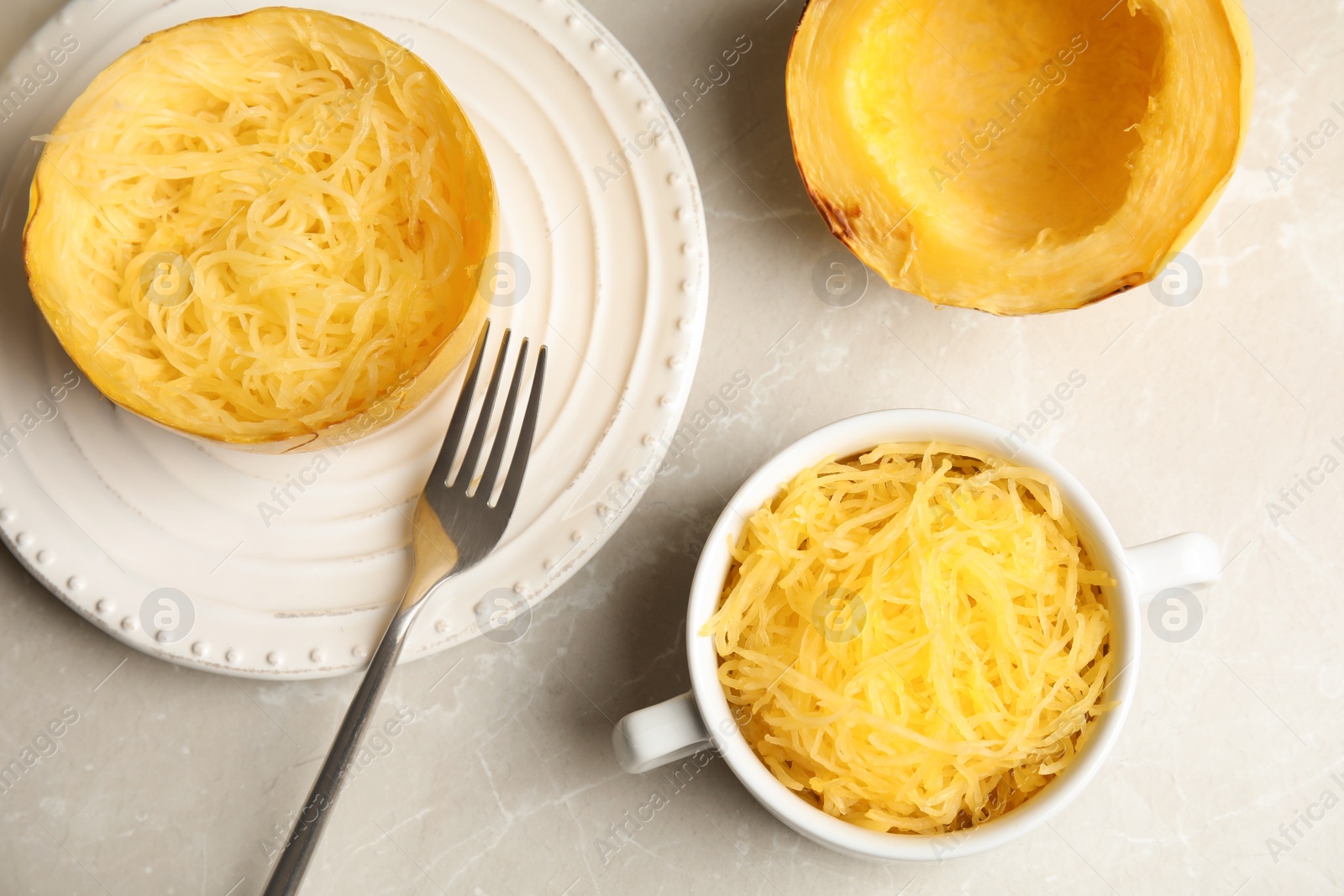 Photo of Cooked spaghetti squash served on table, flat lay