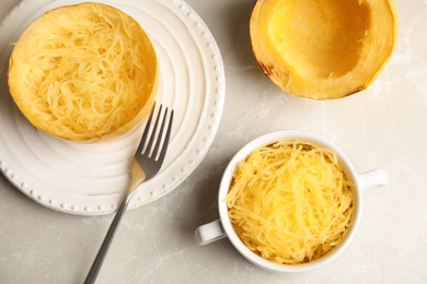 Cooked spaghetti squash served on table, flat lay