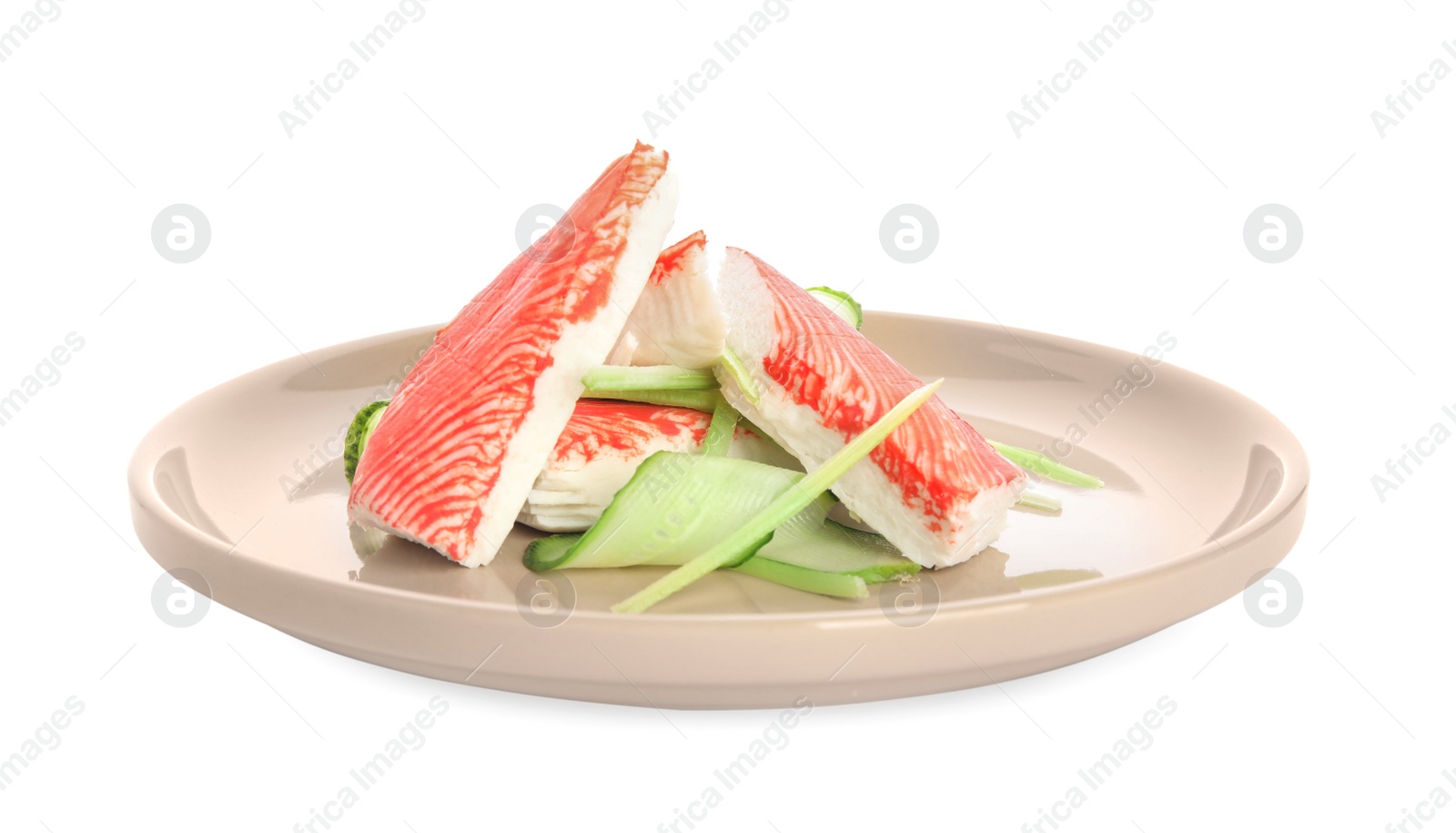 Photo of Plate with fresh crab sticks and cucumber isolated on white