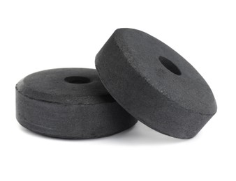 Photo of Charcoal rings for hookah on white background