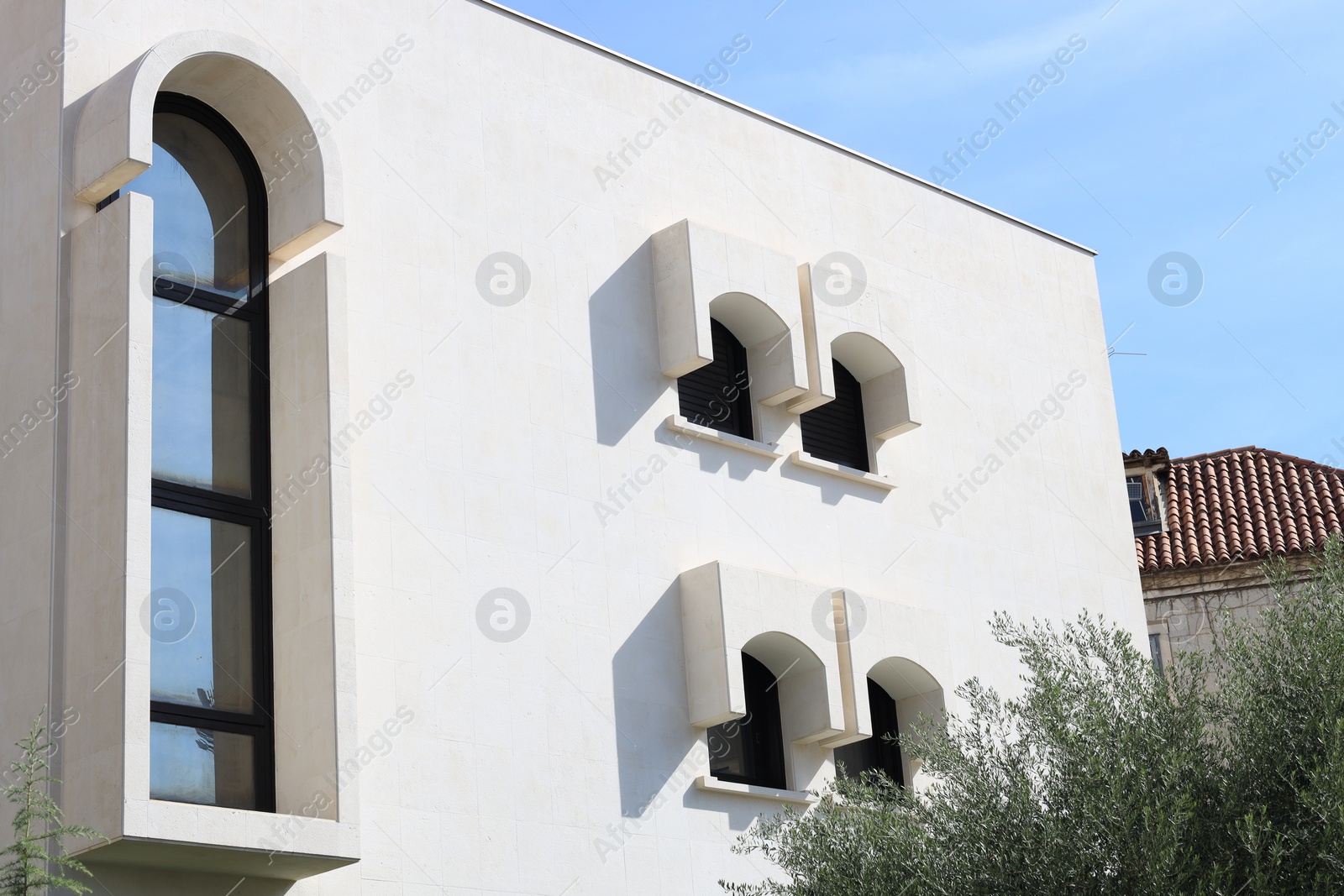 Photo of Exterior of residential building against blue sky