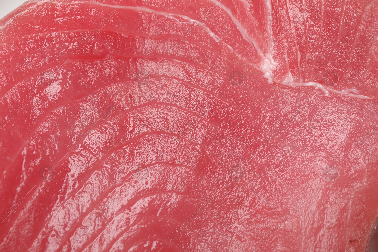 Photo of Fresh raw tuna fillet as background, top view