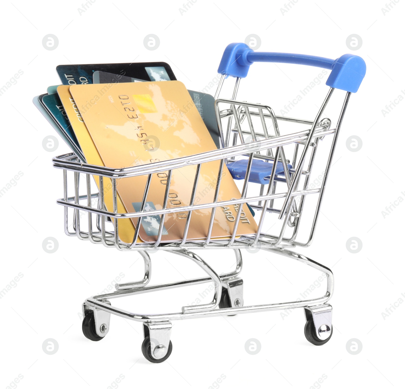 Photo of Small metal shopping cart with credit cards isolated on white