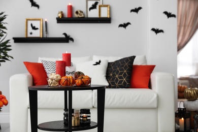 Photo of Halloween decor in room. Idea for festive interior