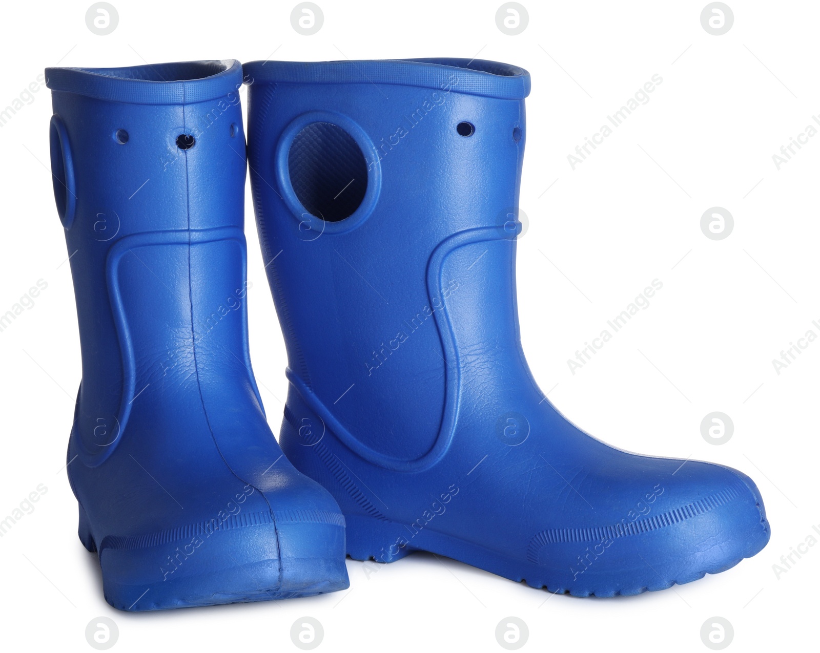 Photo of Modern blue rubber boots isolated on white