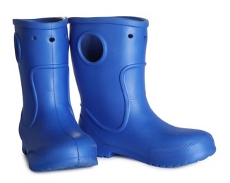 Photo of Modern blue rubber boots isolated on white