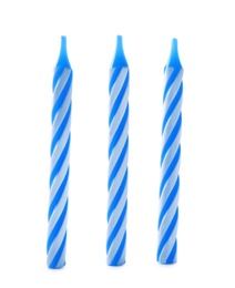 Blue striped birthday candles isolated on white