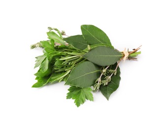 Photo of Bundle of aromatic bay leaves and different herbs isolated on white