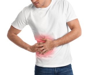 Man suffering from liver pain on white background, closeup